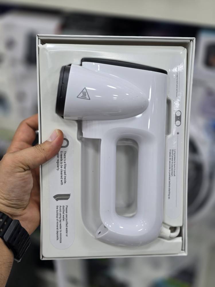 دستگاه اتو بخار مکشی (Aspirating Steamer / Suction-Type Ironing Machine)