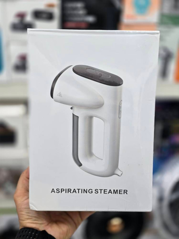 دستگاه اتو بخار مکشی (Aspirating Steamer / Suction-Type Ironing Machine)